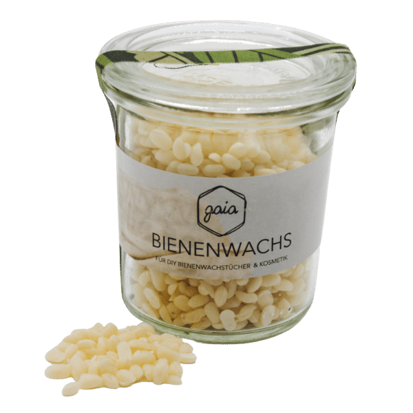 Hier ist das Glas mit den Bienenwachspastillen zusehen. Links daneben sind nochmal die Pastillen näher zu sehen.