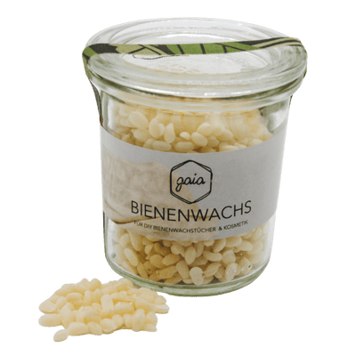 Hier ist das Glas mit den Bienenwachspastillen zusehen. Links daneben sind nochmal die Pastillen näher zu sehen.
